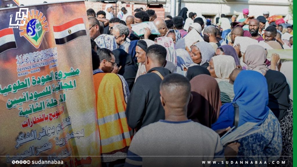 1300 سوداني يغادرون القاهرة على متن قطار العودة الطوعية رقم 13 1 1300 سوداني يغادرون القاهرة على متن قطار العودة الطوعية رقم 13
